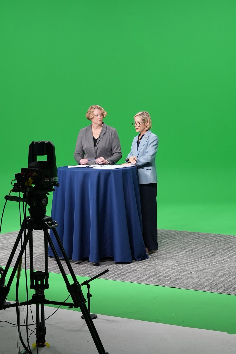 Two Ohio BWC presenters at a studio table with a broadcast camera in the foreground