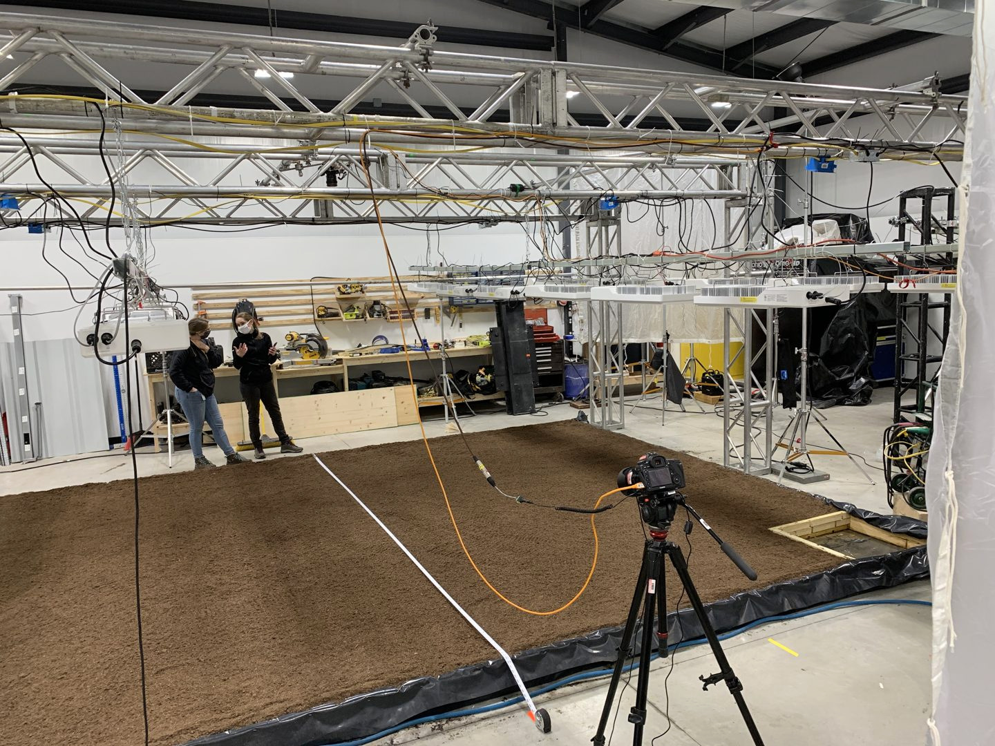 Prepared soil bed with a camera and overhead lighting
